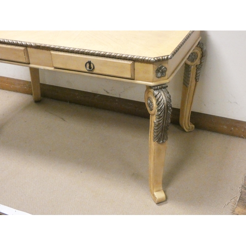 475 - Continental cream and gilt decorated centre table fitted drawers on cabriole legs, 50