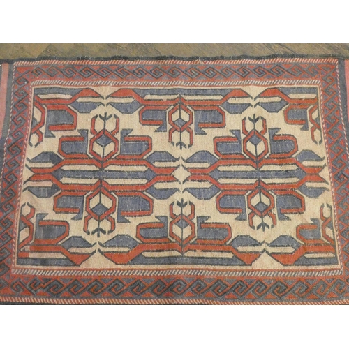 176 - Two small red and patterned wool pile rugs