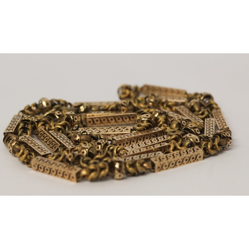 691 - Early 19th century long guard chain of fancy box links and granulated chain links, the clasp modelle... 