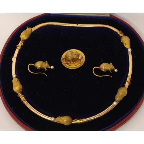 693 - A Victorian gold and pearl suite of jewellery, comprising a choker necklace, pair of drop earrings a... 