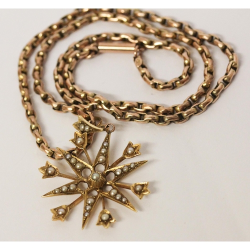 700 - Edwardian 15ct gold star pendant set with seed pearls suspended on a 9c barrel link chain. Pendant 4... 