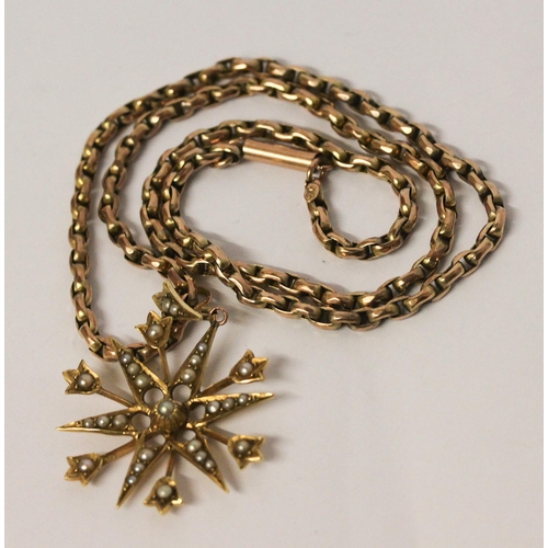 700 - Edwardian 15ct gold star pendant set with seed pearls suspended on a 9c barrel link chain. Pendant 4... 