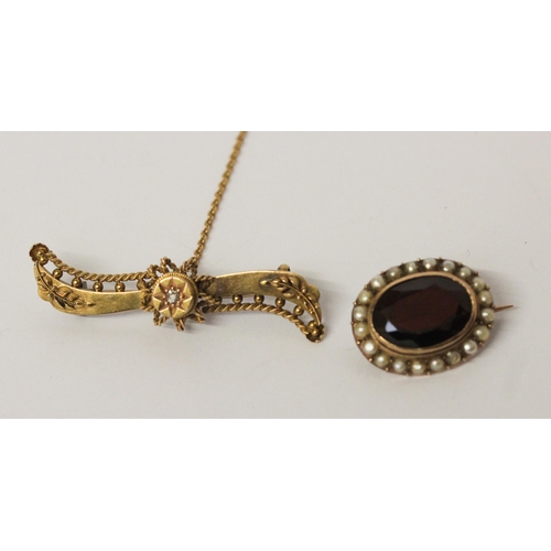 704 - A Victorian garnet and seed pearl oval cluster brooch 20mm across, and a Victorian 15ct gold bar bro... 