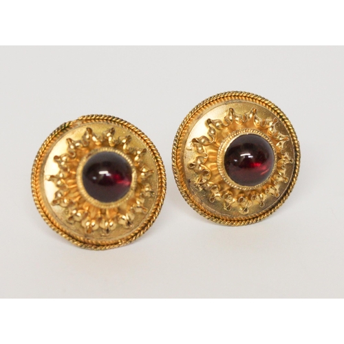 706 - A pair of Victorian  earrings in the Etruscan style, of circular form set with cabochon garnet to th... 