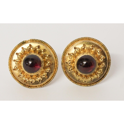 706 - A pair of Victorian  earrings in the Etruscan style, of circular form set with cabochon garnet to th... 