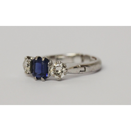 707 - A sapphire and diamond three stone ring, in unmarked platinum setting, with snap open hinged expandi... 