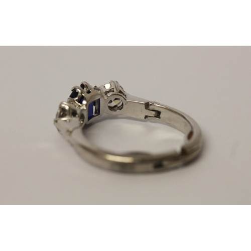 707 - A sapphire and diamond three stone ring, in unmarked platinum setting, with snap open hinged expandi... 