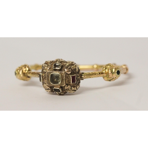 713 - Antique continental gold and gem set hinged bangle, with three raised box panels set with sapphire, ... 