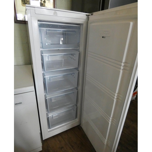 858 - A tall Fridge Master freezer