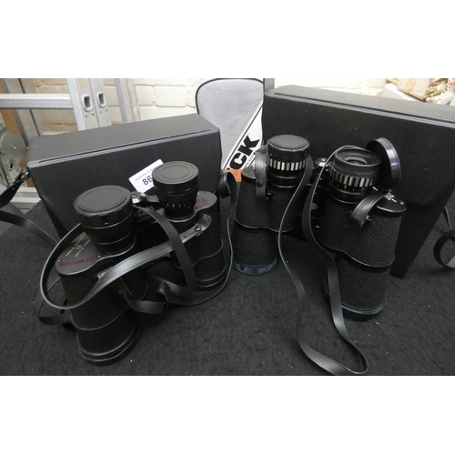 869 - Two pairs of binoculars in carrying case