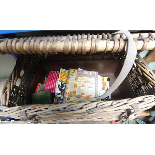 946 - An old wicker basket, magazines etc