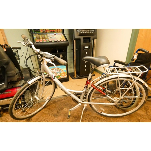 957 - A silver and red Pioneer ladies bicycle with rear rack, mudguards etc