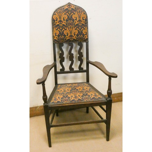 451 - Edwardian Arts & Crafts oak elbow chair with tall back upholstered in vintage fabric