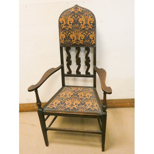 451 - Edwardian Arts & Crafts oak elbow chair with tall back upholstered in vintage fabric