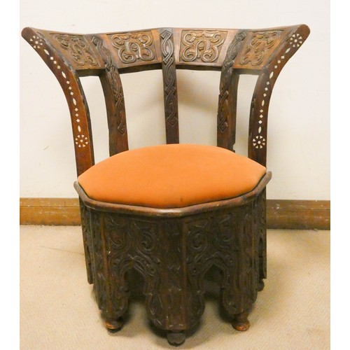 464 - Moroccan style octagonal carved corner chair with mother of pearl inlay