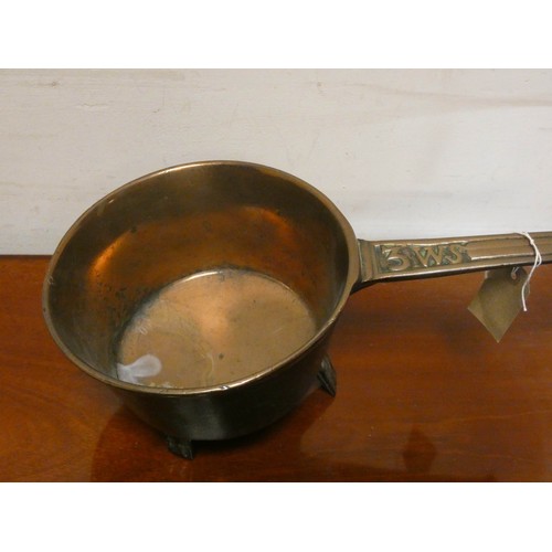 388 - Heavy antique copper melting pot style saucepan on three feet, handle marked 3WS