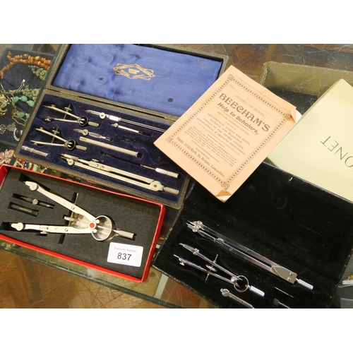 837 - A collection of cased drawing instruments, compasses etc