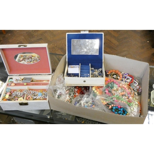 842 - A large collection of costume jewellery within two jewel boxes, beads and more