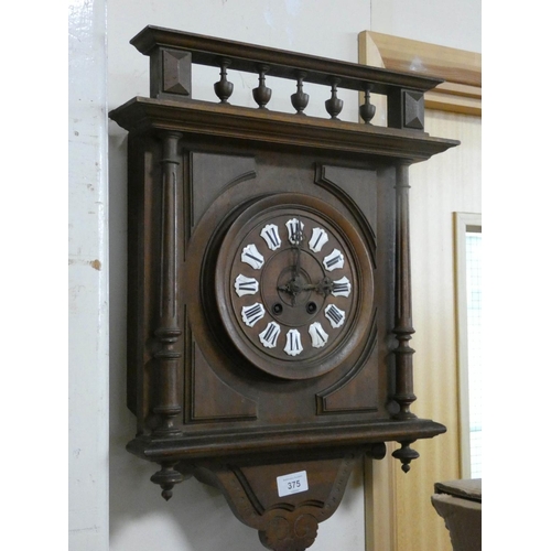 375 - French striking wall clock in walnut case