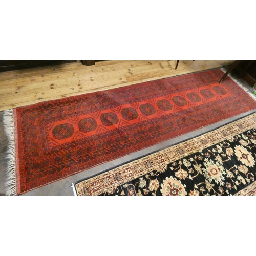 469 - Red & patterned Bokhara carpet runner, 10' x 3' wide