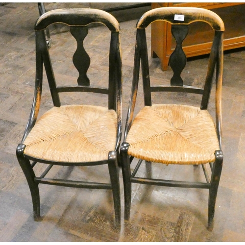 480 - Pair of Victorian ebonised bedroom chairs with rush seats