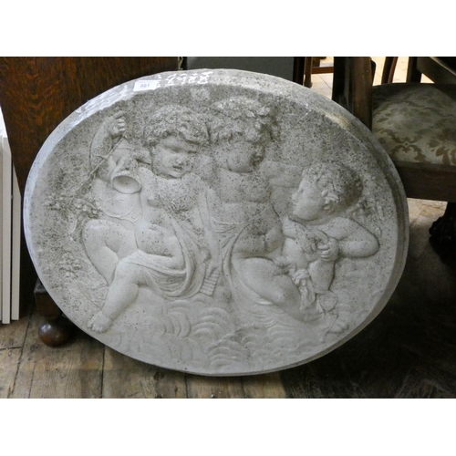 861 - A heavy reconstituted stone wall hanging plaque of young children