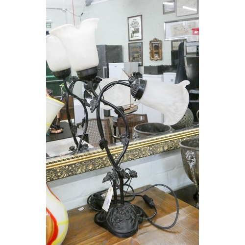 204 - A black metal vine shaped two branch table lamp