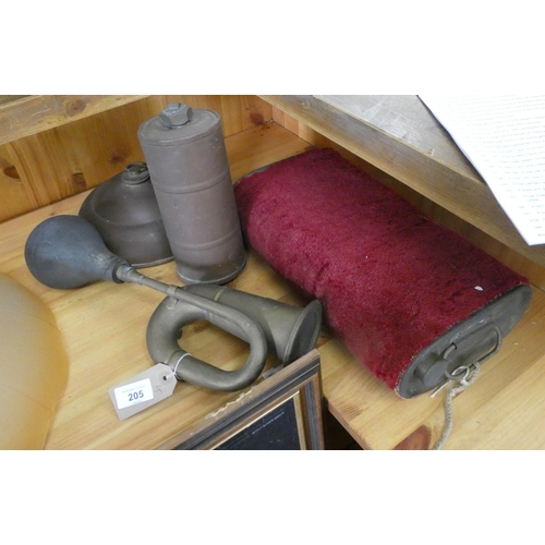 205 - Three various travelling hot water foot warmers and a brass bulb car horn