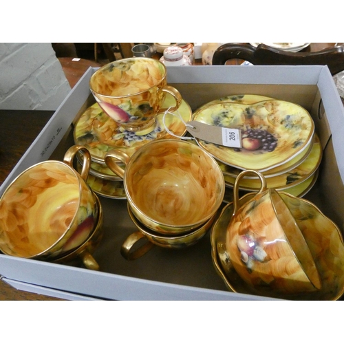 206 - A bone china fruit decorated tea set