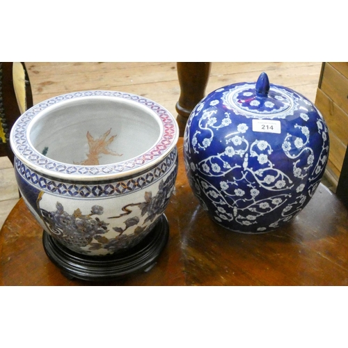 214 - Chinese style blue and white jar with cover and a jardinière with wooden stand