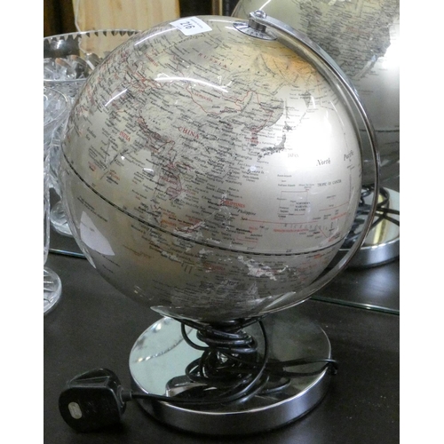 216 - An illuminated globe of the world