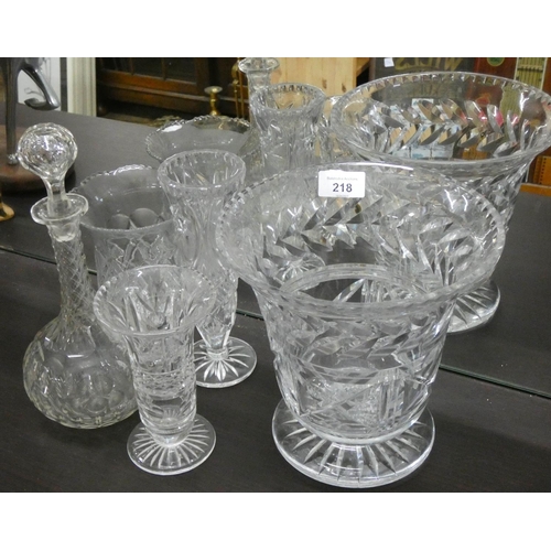 218 - Four various cut glass vases and a decanter