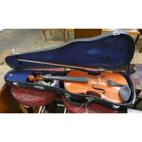 228 - A violin with bow in case