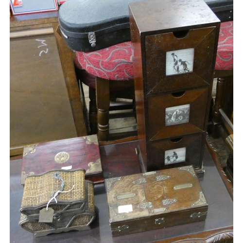 231 - Three drawer CD cabinet, cigarette and cigar box, lacquered and brass box and a wicker work casket