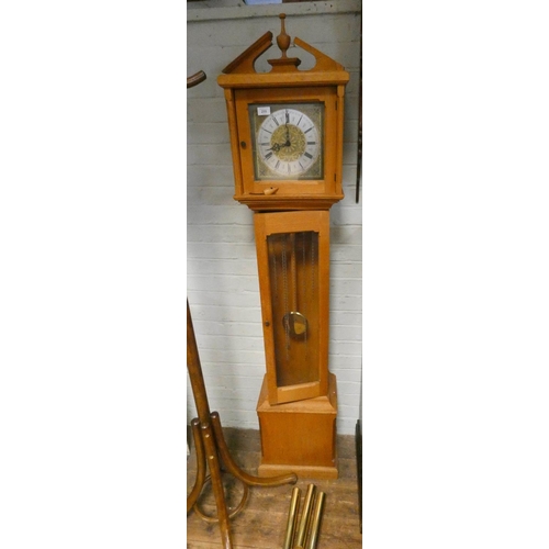 255 - A modern Grandmother clock in light oak case with brass and silver dial