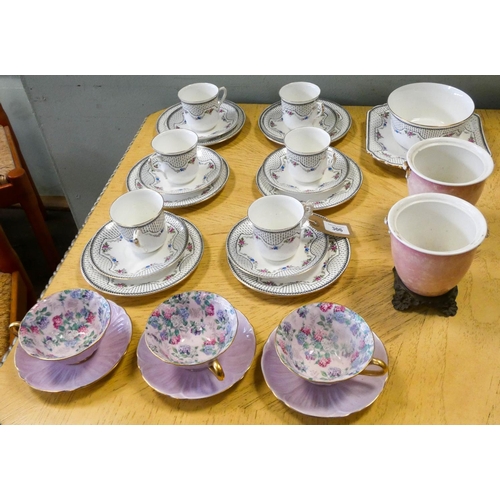 306 - A Shelley tea service comprising six cups and saucers, bread plate, slop bowl and six tea plates, th... 