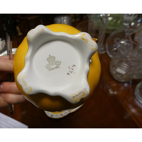 334 - An Aynsley vintage part tea service decorated in Ochre yellow and flower border