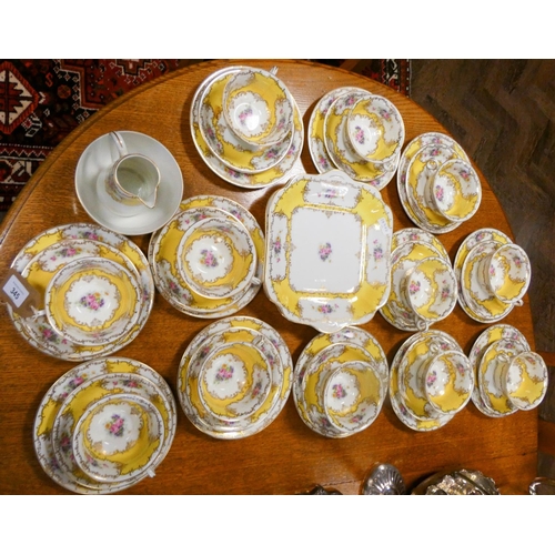 345 - Pretty Bavarian porcelain vintage tea set decorated with roses in yellow borders