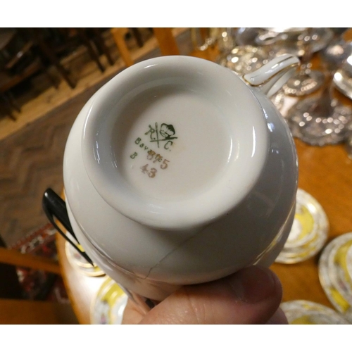 345 - Pretty Bavarian porcelain vintage tea set decorated with roses in yellow borders