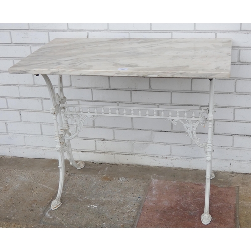 986 - A heavy decorative metal framed marble topped table