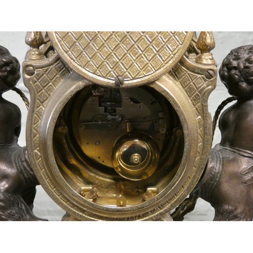 424 - Franz Hermle - An Italian gilt figure mounted striking mantel clock on marble base, movement marked ... 