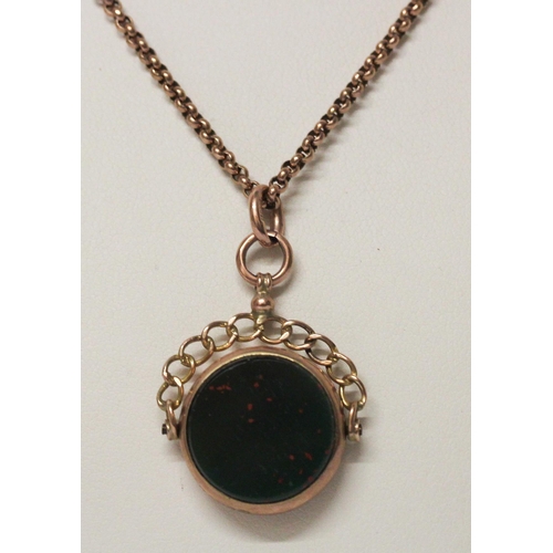 738 - A bloodstone swivel fob, mounted in 9ct rose gold, hallmarked, on a rose gold 9ct belcher link chain... 