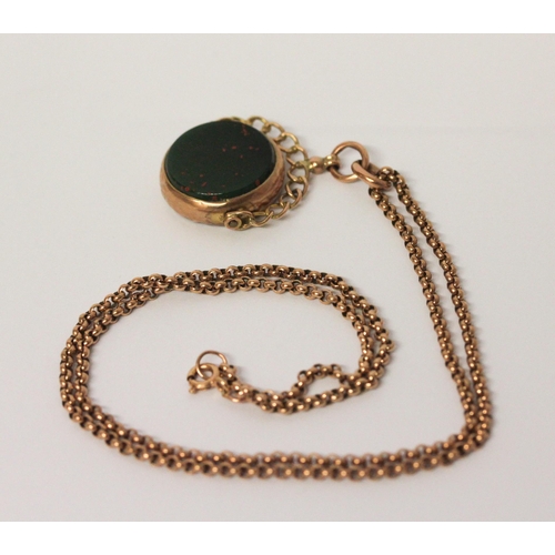 738 - A bloodstone swivel fob, mounted in 9ct rose gold, hallmarked, on a rose gold 9ct belcher link chain... 