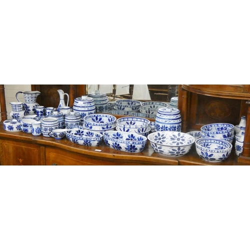 218 - A large quantity of Brazilian blue and white porcelain to include bowls, jars, jugs etc