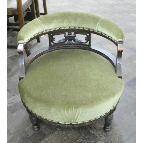 127 - An Edwardian walnut framed circular tub shaped elbow chair