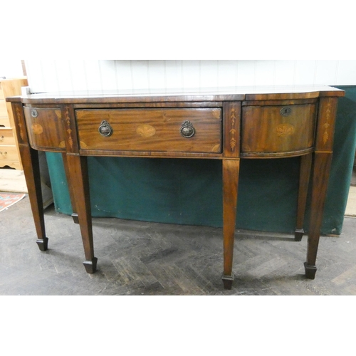 133 - A Georgian style inlaid mahogany shaped front sideboard, fitted cupboards and drawers on square tape... 