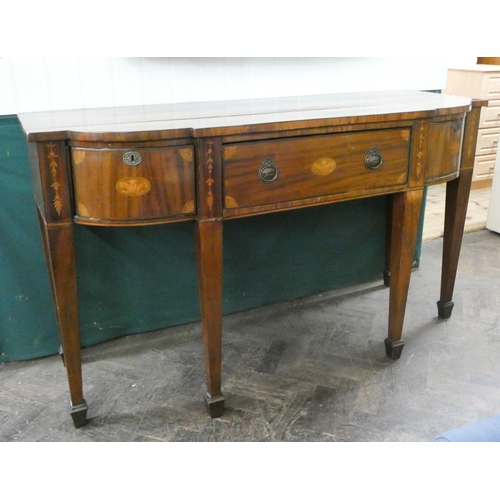 133 - A Georgian style inlaid mahogany shaped front sideboard, fitted cupboards and drawers on square tape... 