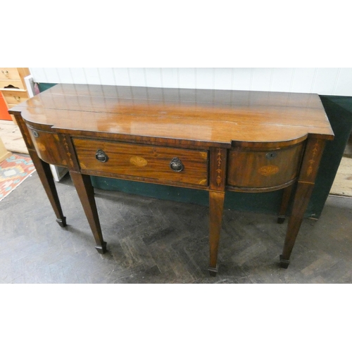 133 - A Georgian style inlaid mahogany shaped front sideboard, fitted cupboards and drawers on square tape... 