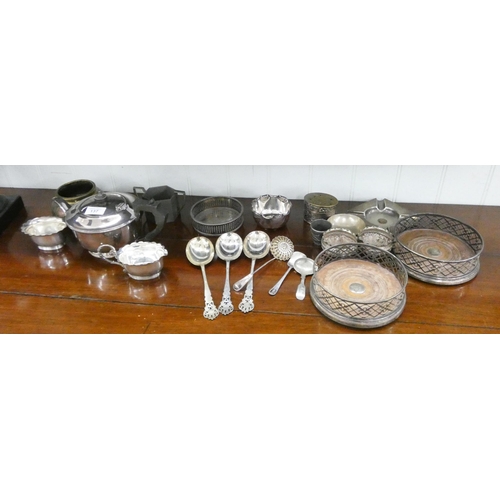 137 - Three piece plated tea set, pair of coasters, spoons, other plate etc