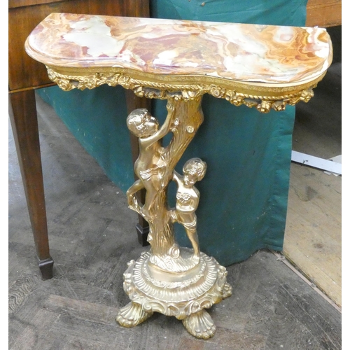 138 - A gilt figure console table with coloured marble top, 29